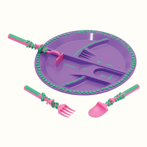 Baby utensil and plate combo for easy feeding, angled view showcasing vibrant colors and ergonomic design.