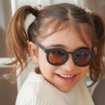 Classic plant-based bendable polarized sunglasses for babies 0-2 years, angled view showcasing sustainable design.
