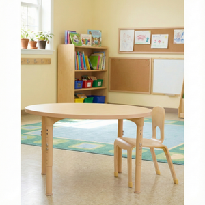 Round adjustable kids table for classrooms and daycares, 36" diameter, height 17" to 25", shown at angle 4.
