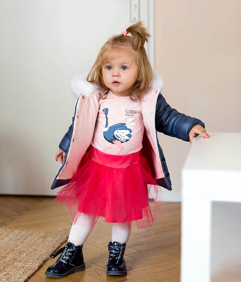 Girls pink summer tulle skirt, perfect for playful outfits and warm weather. Ideal for little fashionistas.