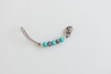 Western-themed pacifier clip for babies, stylish and practical accessory to keep pacifiers secure.