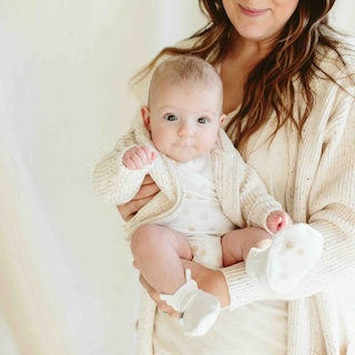 Stay On 2-Pack Mitts in High Prairie and Dandelion for babies, ensuring comfort and style.