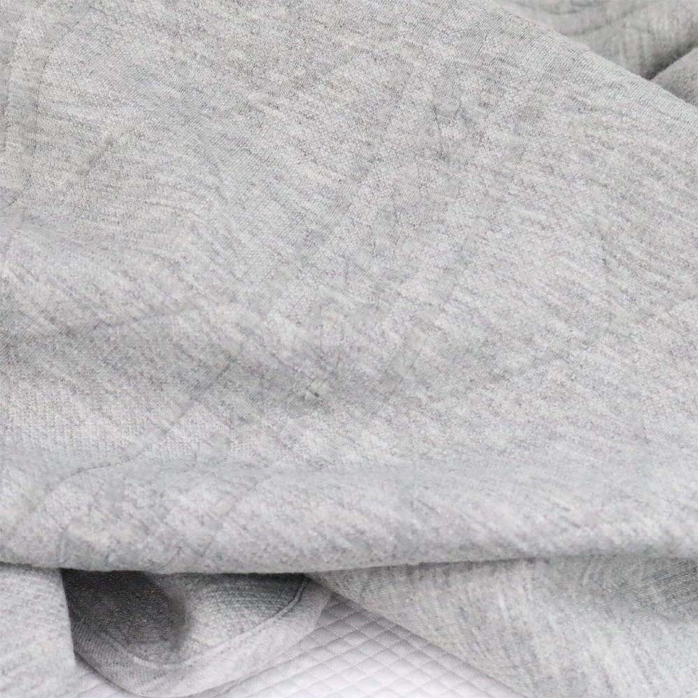 Soft gray knit baby blanket, perfect for keeping your little one cozy and stylish.
