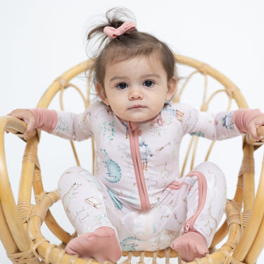 "Once Upon A Time Zipper Lounger for babies in soft fabric, perfect for cozy lounging and playtime."