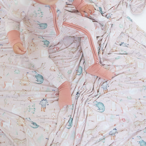 Huggable blanket for babies, featuring a whimsical design from Once Upon A Time, shown at an angle.