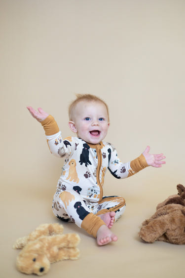 Mutts About You Zipper Lounger for babies in soft fabric, perfect for cozy lounging and playtime.