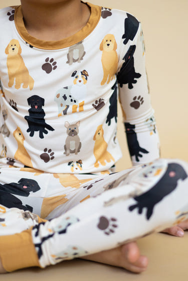"Mutts About You Two-Piece Set for babies, cozy loungewear featuring playful dog prints."