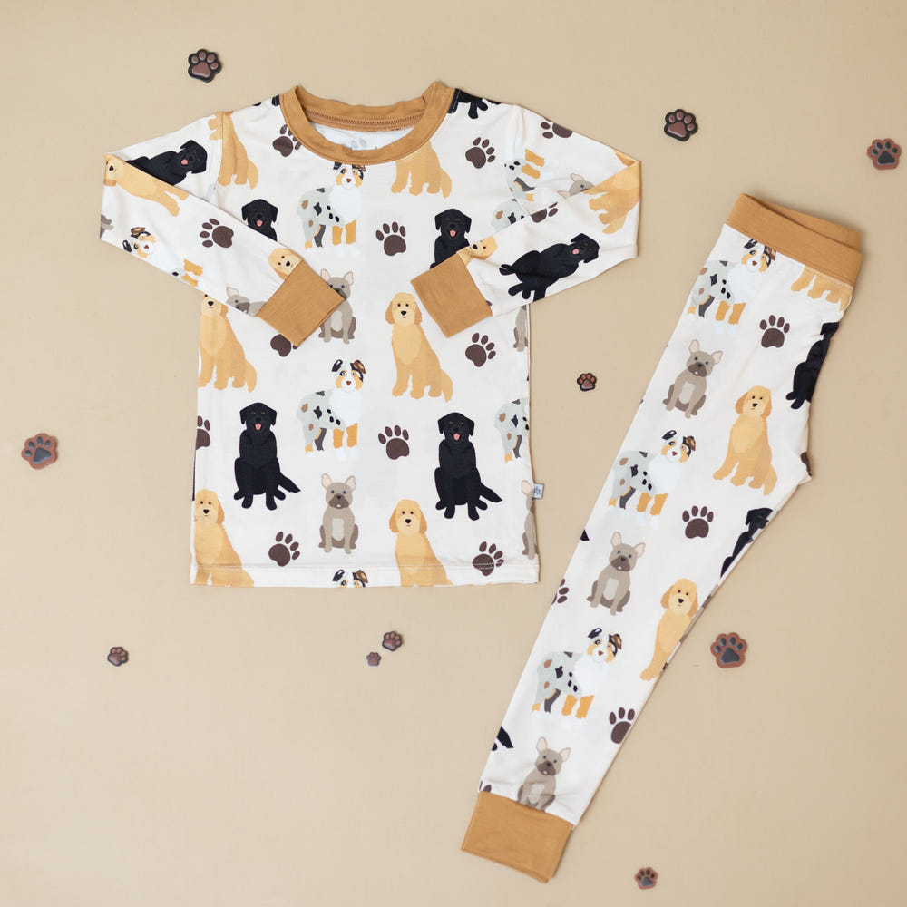 "Mutts About You Two-Piece Set for babies, cozy loungewear featuring playful dog prints."