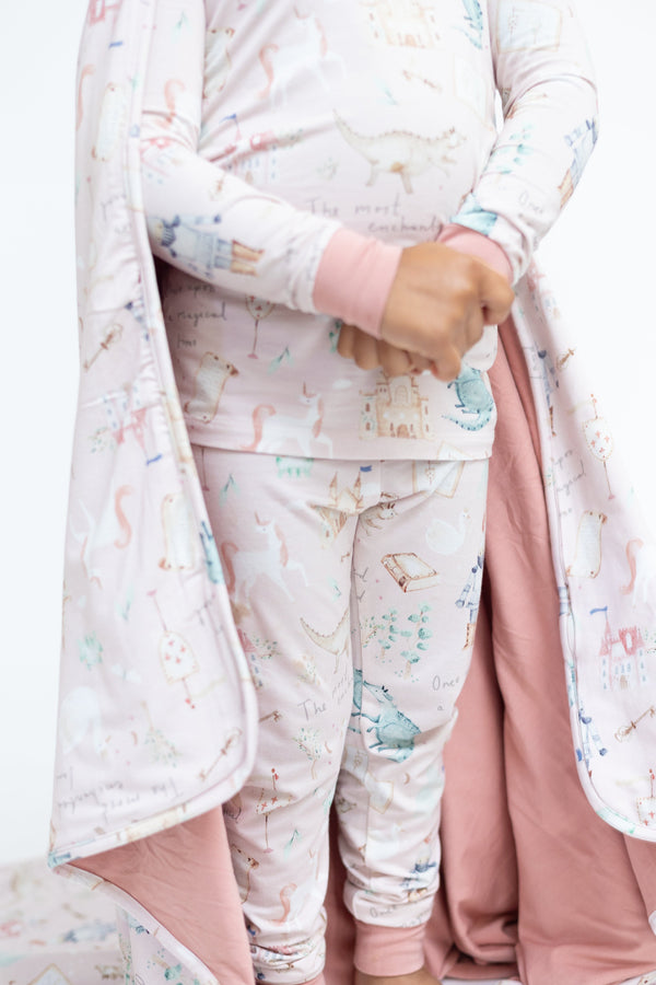 "Once Upon A Time Huggable Blanket in soft fabric, angled view showcasing its cozy design for babies."