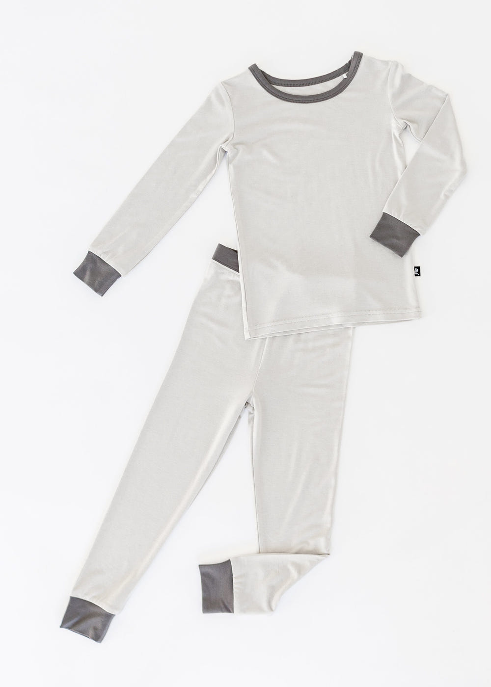 Gray two piece set for babies, featuring a stylish and comfortable design. Perfect for everyday wear.