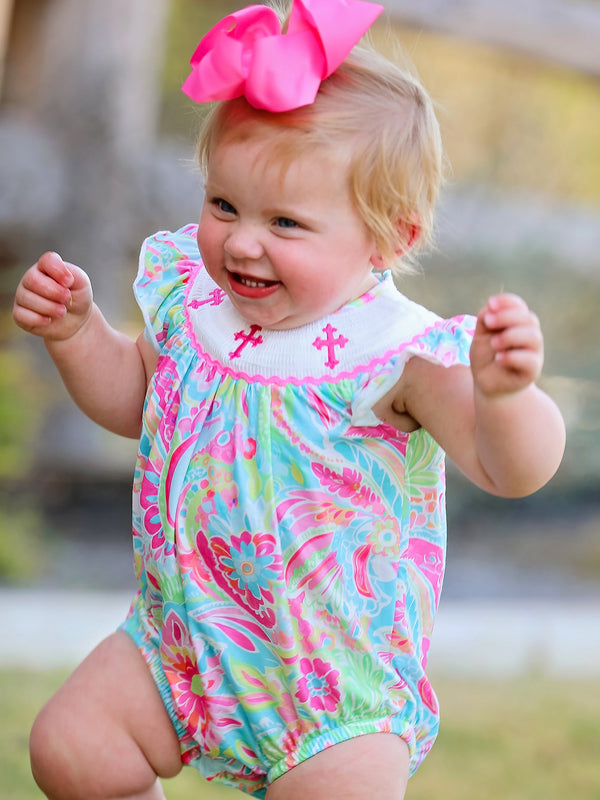 Easter Cross Smocking Embroidery Baby Girl Romper in angle view, perfect for spring celebrations.