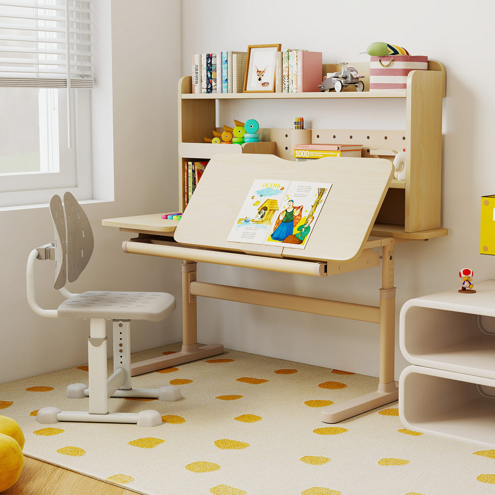 Height adjustable yellow writing table with tilt desktop and retractable book stand for kids.