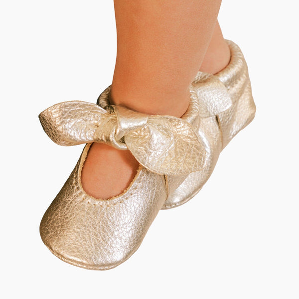 Newborn Platinum Knotted Bow Baby Shoe in angle view, perfect for stylish and comfortable baby footwear.