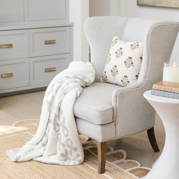 Cozy double-layer Bamboni® throw blanket for babies, perfect for swaddling and keeping warm.