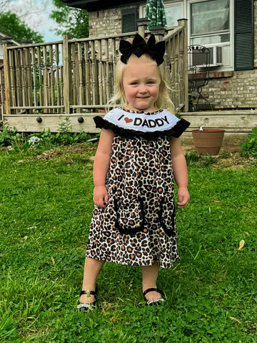 Smocked leopard I love daddy dress for babies - stylish and adorable outfit for little ones.