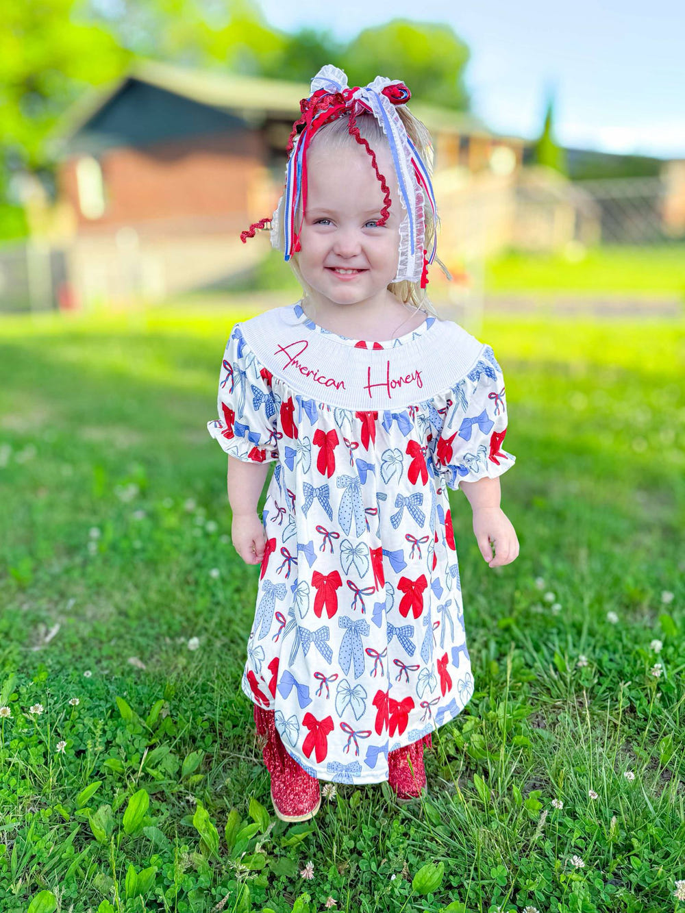 Smocked American honey bows dress for babies, stylish and comfortable clothing for little ones.