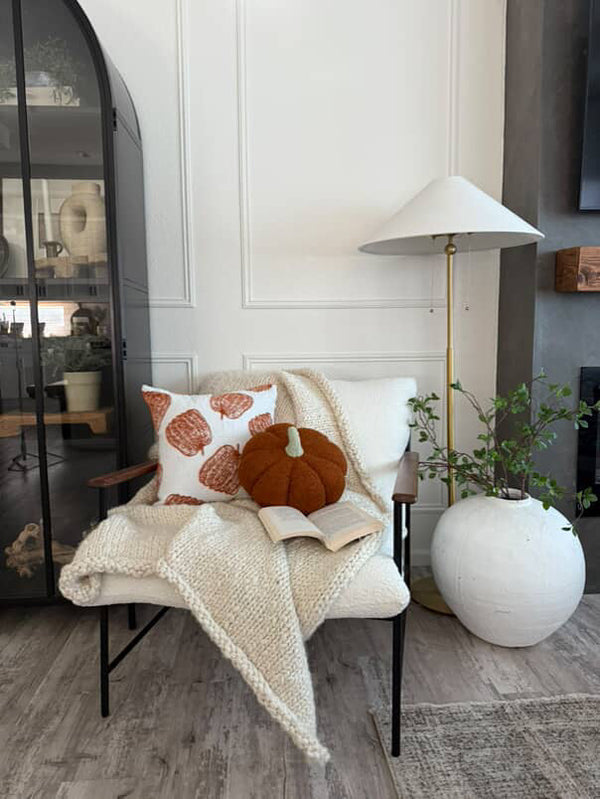 11” Jumbo Sherpa Orange Pumpkin Pillow at angle 3, perfect for cozy nursery decor and seasonal accents.