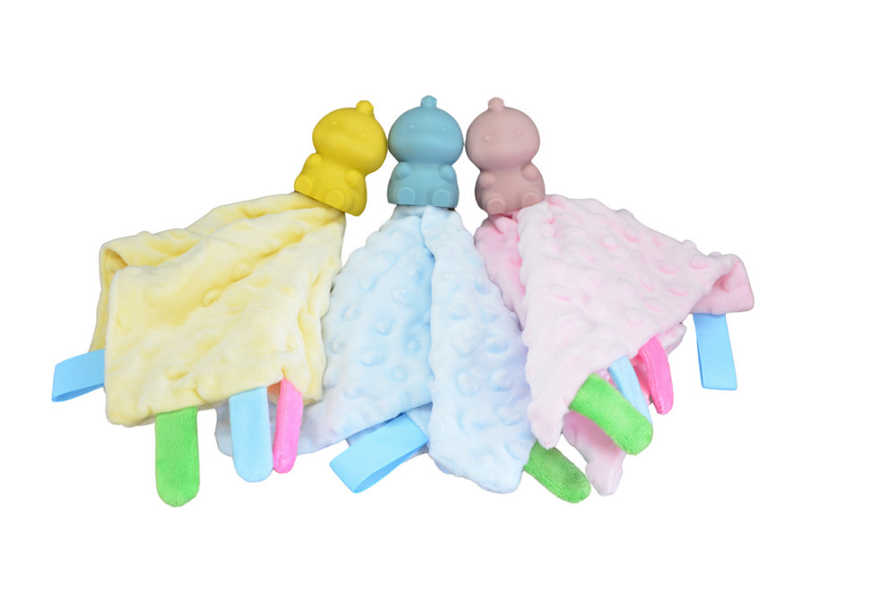 Pink Dino Blanket Buddy plush toy, perfect comforter for babies and toddlers. Soft, cuddly, and adorable.