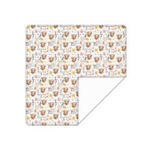 Soft Pasture Petals swaddle blanket for babies, perfect for comfort and warmth during nap time.