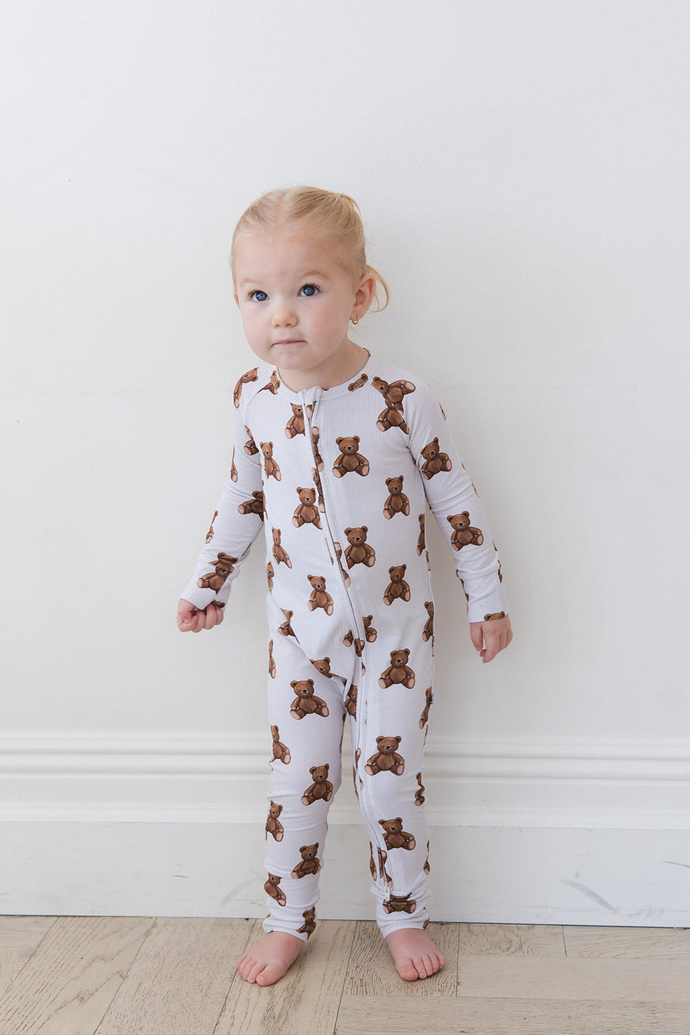 Cozy Bear Zippy zip pajamas for babies, featuring soft fabric and playful design for comfort and style.