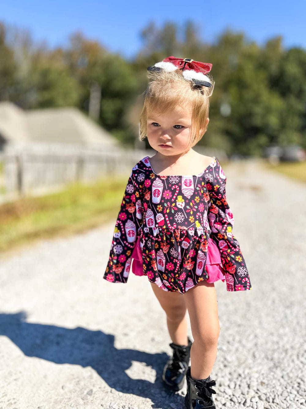 Pink Christmas coffee ruffle romper for babies, perfect festive outfit for holiday celebrations.
