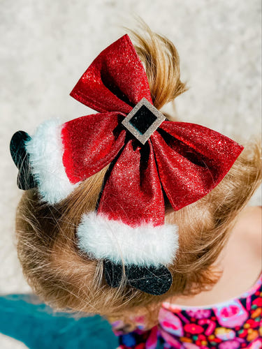 Christmas Bow socks clip for babies, perfect accessory for hats, socks, and mittens.