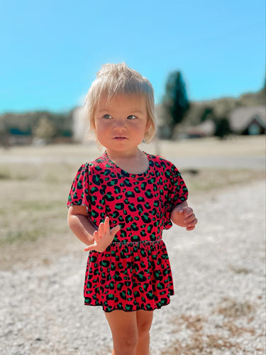 Christmas Leopard ribbed skirted romper for babies, perfect for festive occasions and stylish playtime.
