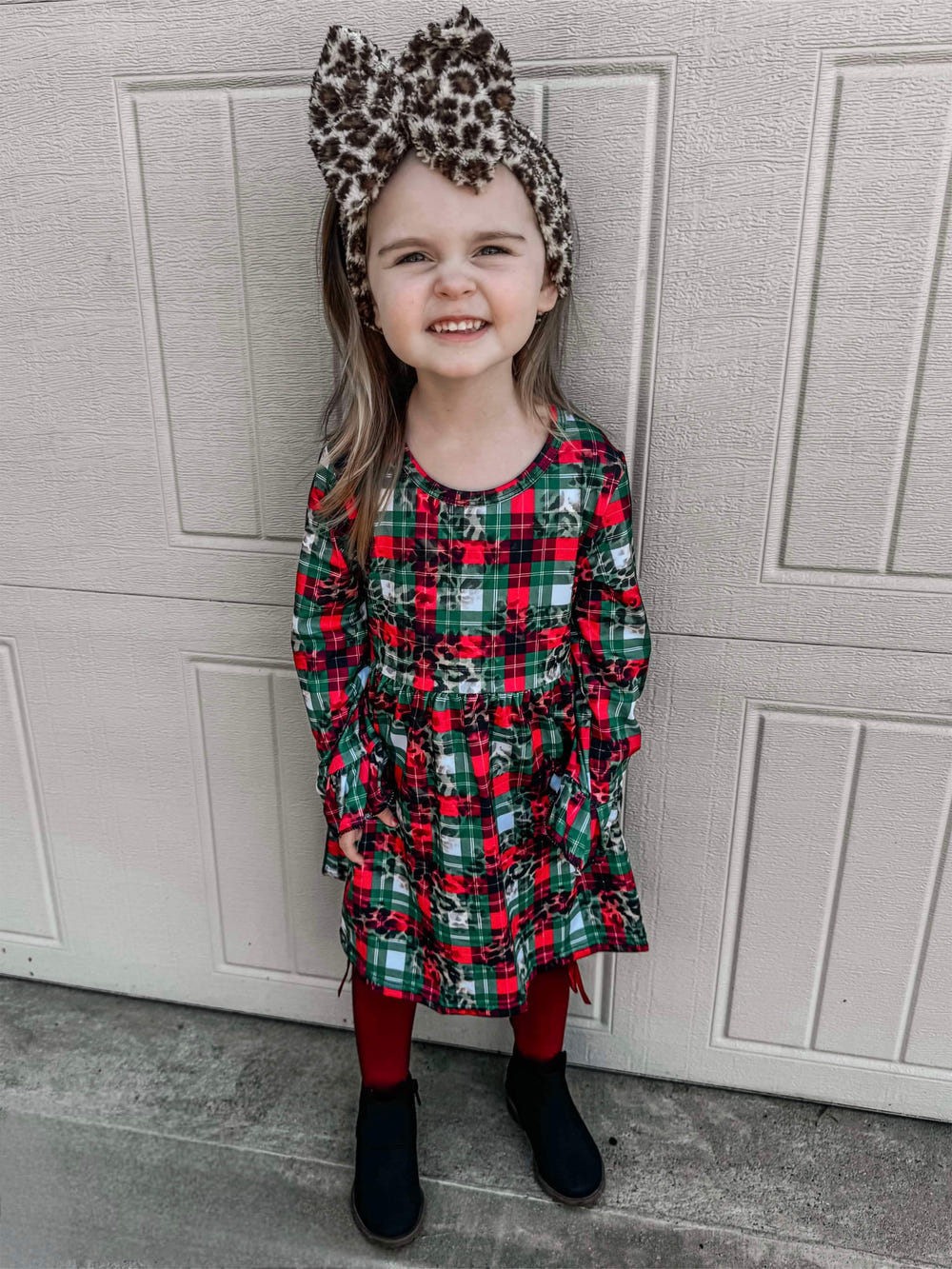 Leopard plaid bell sleeve dress for babies, stylish and comfortable clothing for little ones.
