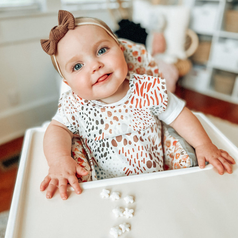 Wild Bapron for babies: stylish, functional bib apron for mess-free mealtime fun.