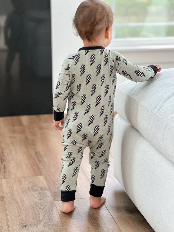 "Strike All Night Zippy baby sleep sack in cozy bedding, angle 8 view showcasing comfort and style for peaceful sleep."