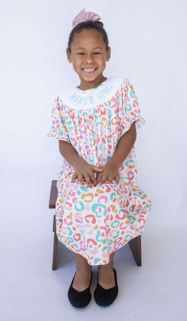 Smocked Mamas girl's summer leopard dress - stylish and playful outfit for little ones.