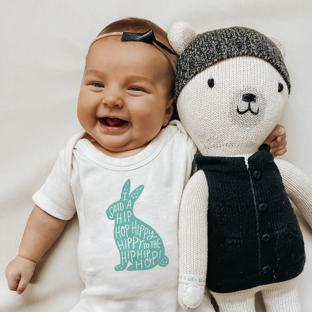 Graphic bodysuit for babies featuring a fun hippy hoppy design, perfect for stylish and comfortable wear.