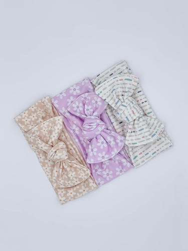 "Colorful baby headbands for stylish infants, perfect for hats, socks, and mittens collection."