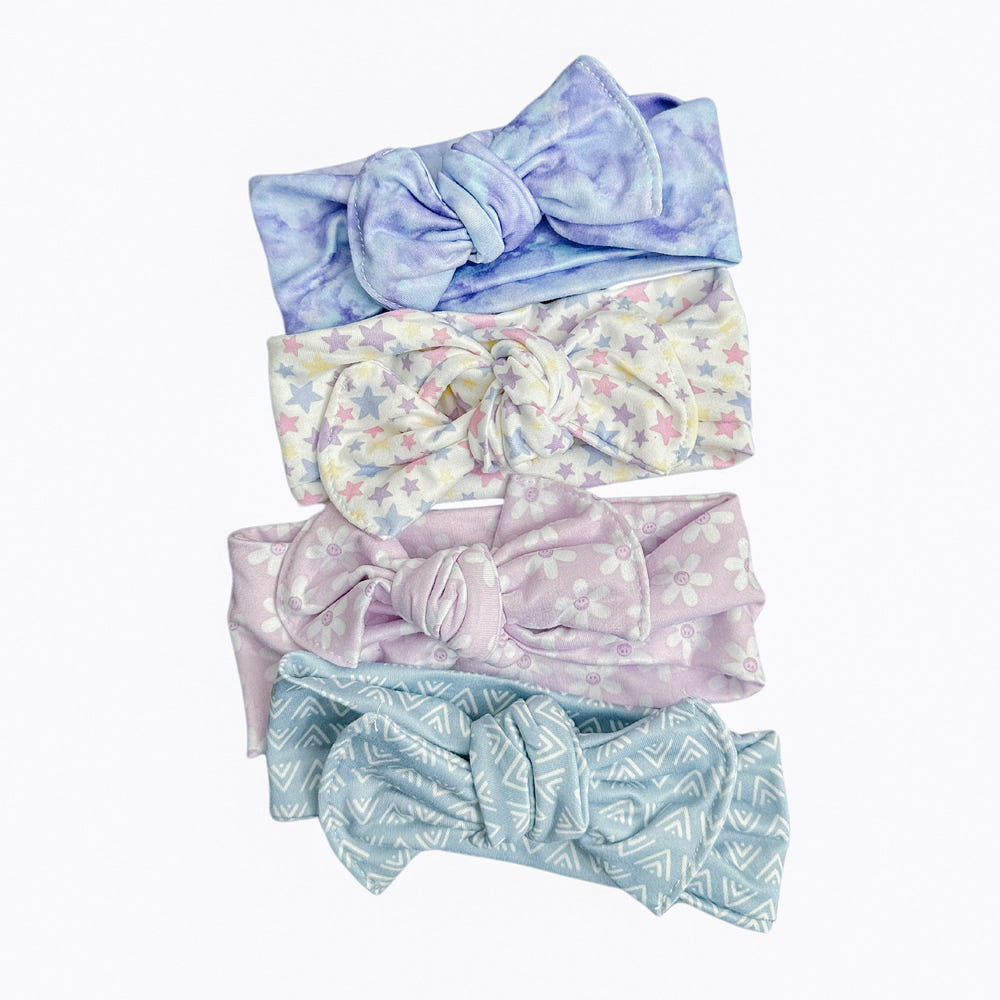 "Colorful baby headbands for stylish infants, perfect for hats, socks, and mittens collection."