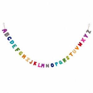 Rainbow felt alphabet banner garland hanging in a curve against a plain white background