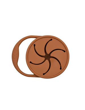 Silicone snack container for babies, perfect for on-the-go meals and snacks, shown at an angle.