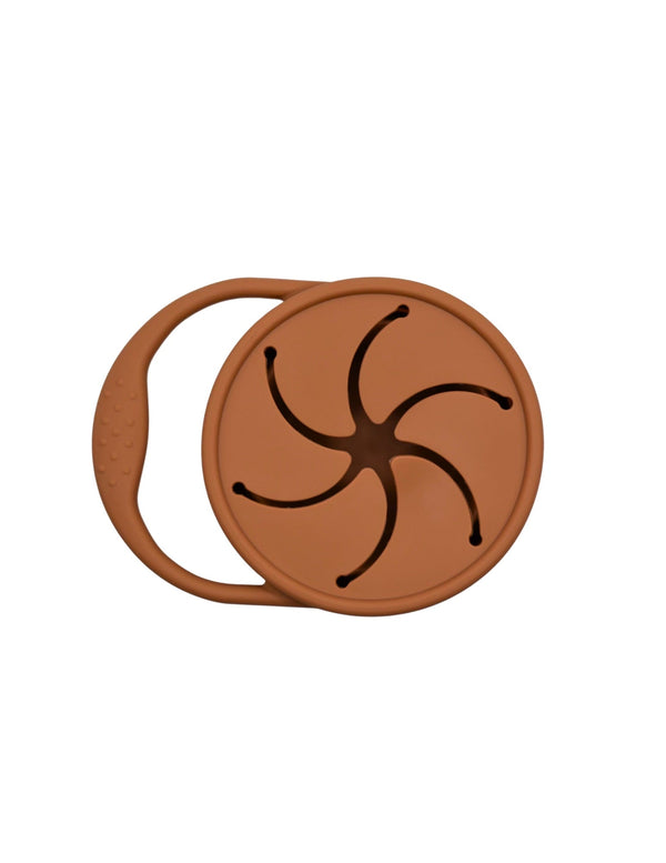 Silicone snack container for babies, perfect for on-the-go meals and snacks, shown at an angle.