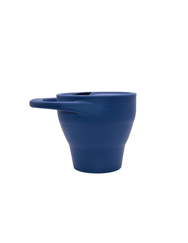 Silicone snack container for babies, showcasing a durable design and vibrant colors, angled view.