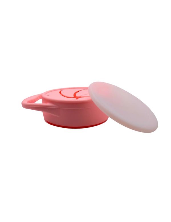 Silicone snack container for babies, angled view showcasing its durable design and vibrant colors.