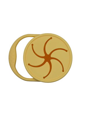 Silicone snack container for babies, angled view showcasing its durable design and vibrant colors. Perfect for on-the-go snacks.