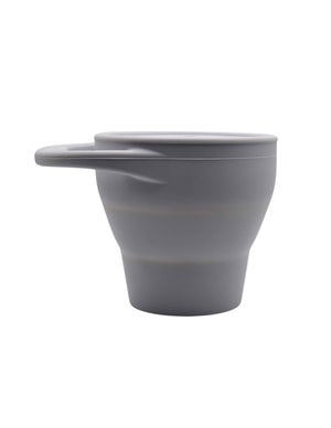 Silicone snack container for babies, angled view showcasing its durable design and vibrant colors. Perfect for on-the-go snacks.