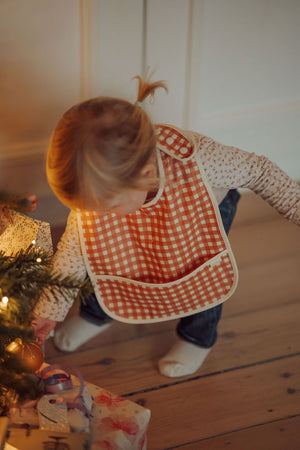 Sienna Gingham Basic Bib at angle 3, perfect for keeping your baby clean during mealtime.