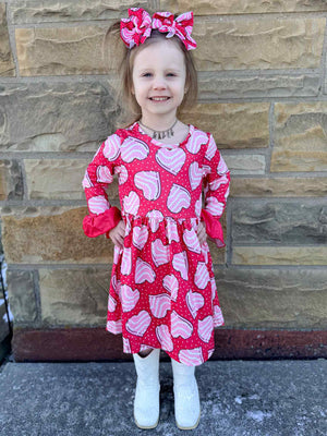 Red bell sleeve dress for babies, perfect for special occasions and everyday wear.