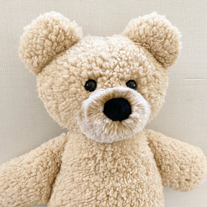 Blessing Bear® prayer bear in a cozy angle, perfect for comforting and inspiring little ones.