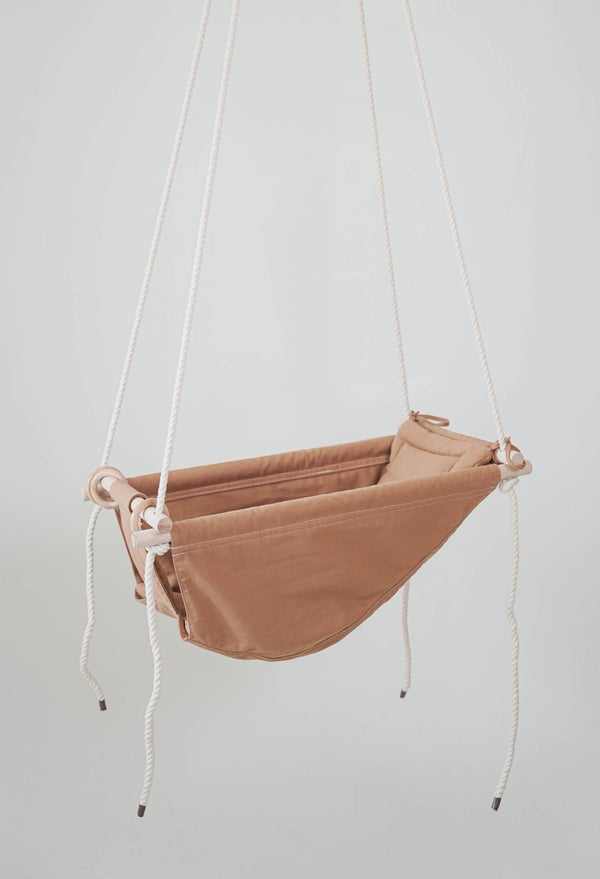"Grow With Me Nutmeg swing at angle 3, perfect for babies to relax and play comfortably."