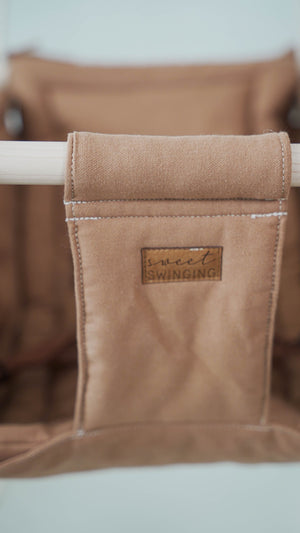 "Grow With Me Nutmeg swing at angle 4, designed for comfort and style for your baby."
