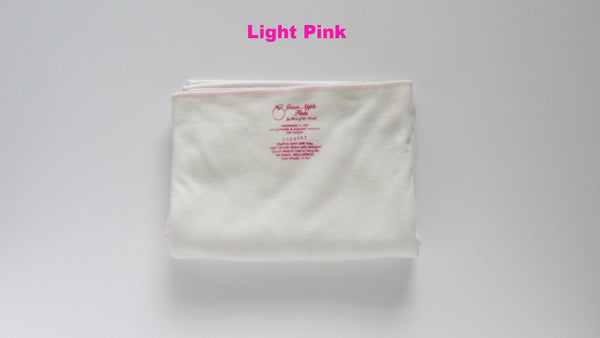 Stretchy flat cloth diapers in a versatile design, angled view showcasing softness and flexibility for comfortable baby care.