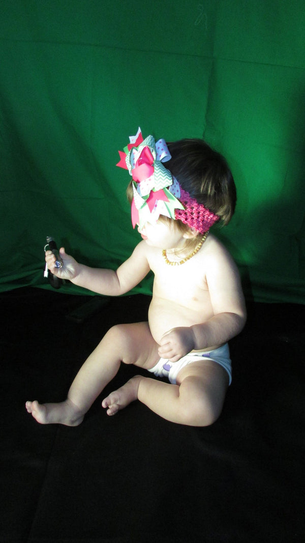 Stretchy flat cloth diapers in various colors, displayed at angle 3 for a clear view of texture and design.