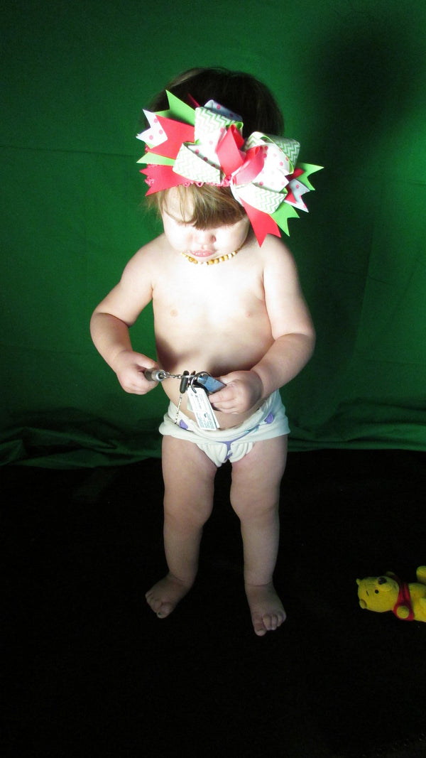 Stretchy flat cloth diapers in various colors, displayed at an angle for a stylish and practical baby care solution.