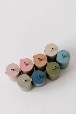 Colorful toddler cups with straw, perfect for little hands and easy sipping, displayed at a 10-degree angle.